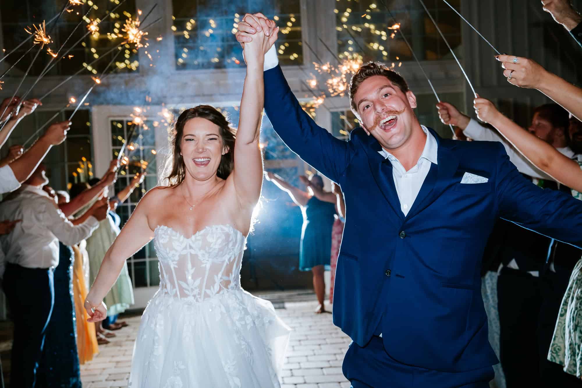 Bride and Groom Sparkler Exit - Atlanta wedding photographers at Ever After Farms in Florida