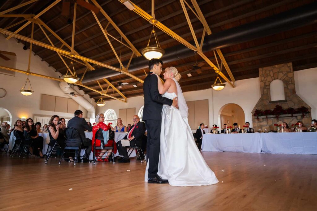 Couple's first dance as husband and wife at the historic Magnolia Building in Lakeland - captured by destination wedding photographers - Peach State Weddings