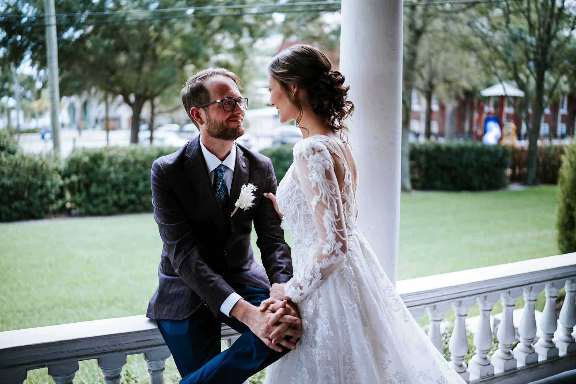 bride and groom having an unscripted moment before their ceremony in Tampa Florida. Captured by Atlanta Wedding Photographer - Peach State Weddings
