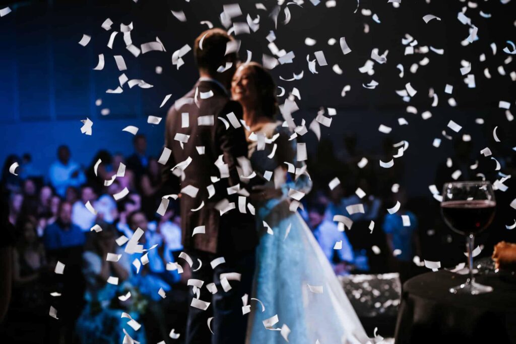 confetti raining on the couple right after they said YES. Atlanta destination wedding photographer at Florida wedding in Tampa