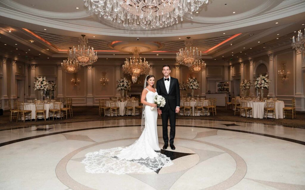 Bride and Groom checking out the reception space before the guests get to enter at the Rockleigh wedding venue in New Jersey 