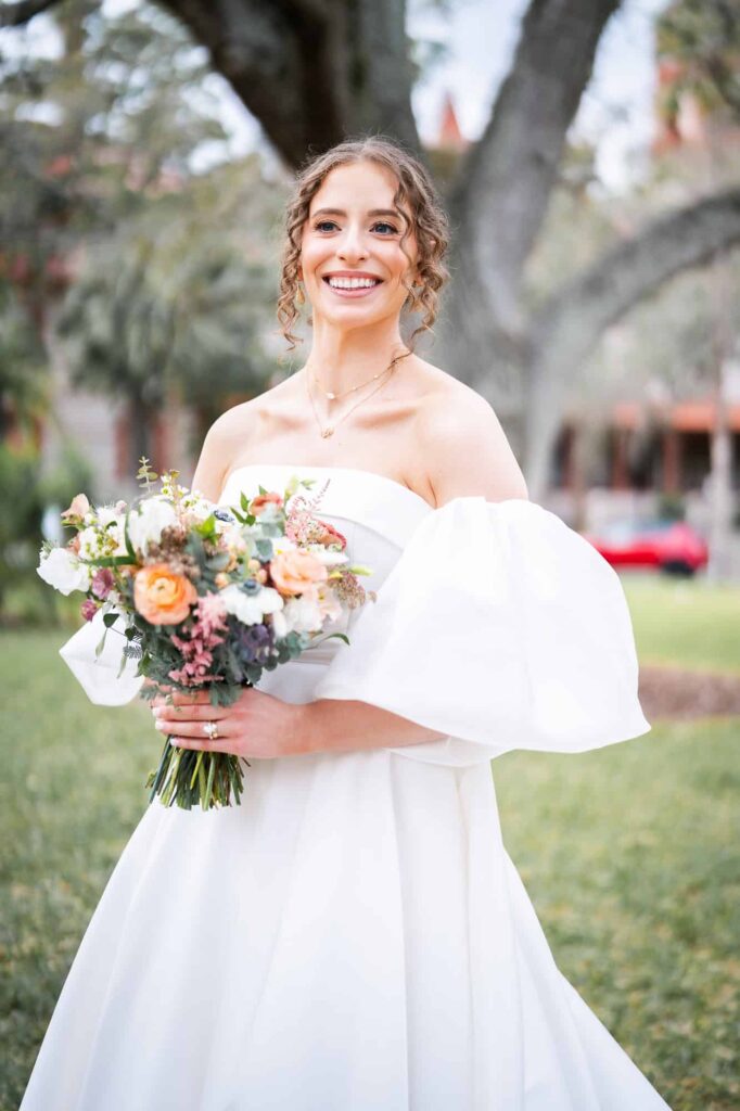 jewish bride with her bridal bouquet at a jewish destination wedding at Casa Monica in St Augustine, captured by Atlanta destination photographer Peach State Weddings