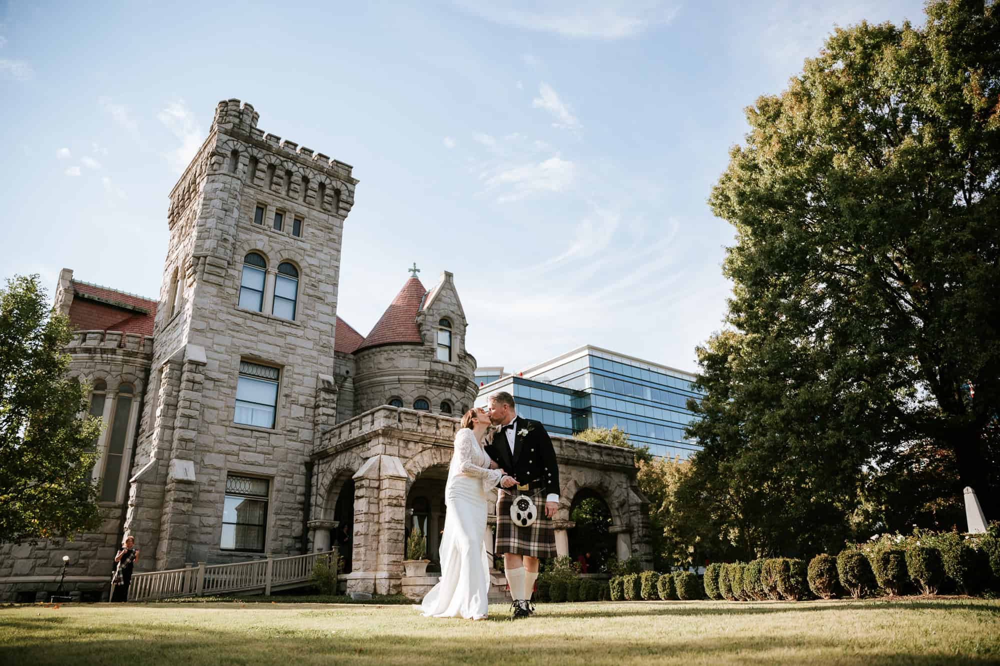 Full view of the historic "Castle on Peachtree" (Rhodes Hall) as a backdrop for a regal Atlanta wedding ceremony.