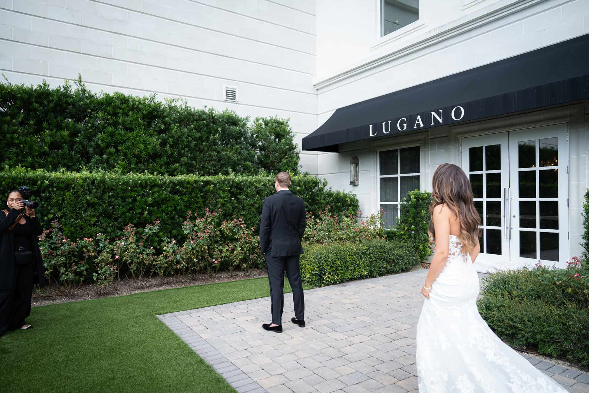 A bride and groom sharing an emotional first look in the rose garden at the World Equestrian Center, captured by Atlanta Georgia wedding photographer Peach State Weddings.