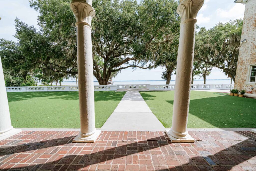 View from Bella Cosa over the back patio that can be used as ceremony site or for the reception to the lake 
