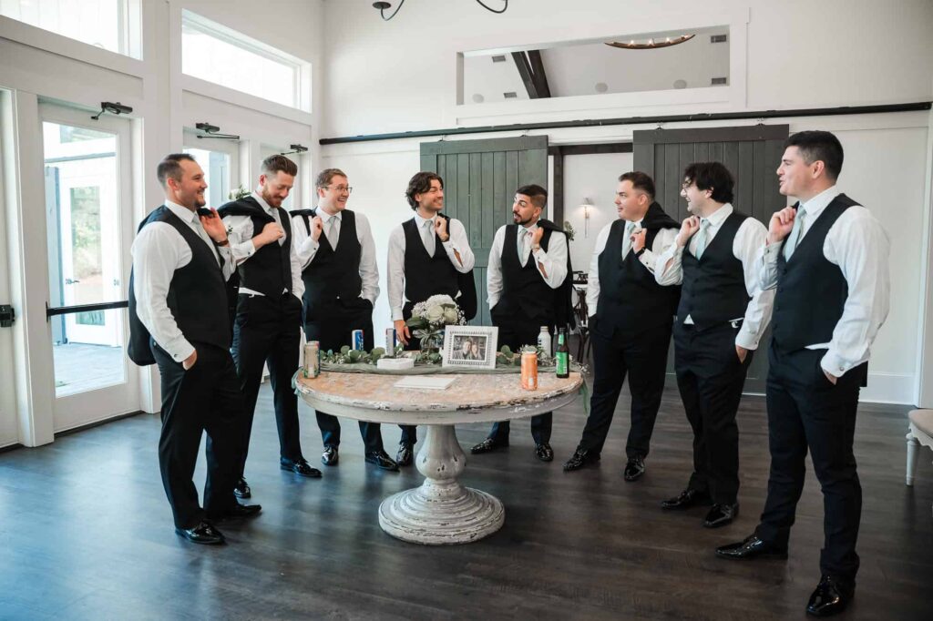 Georgia wedding photographers capturing the groom and his groomsmen just moments before the wedding ceremony at the venue at daisy hill
