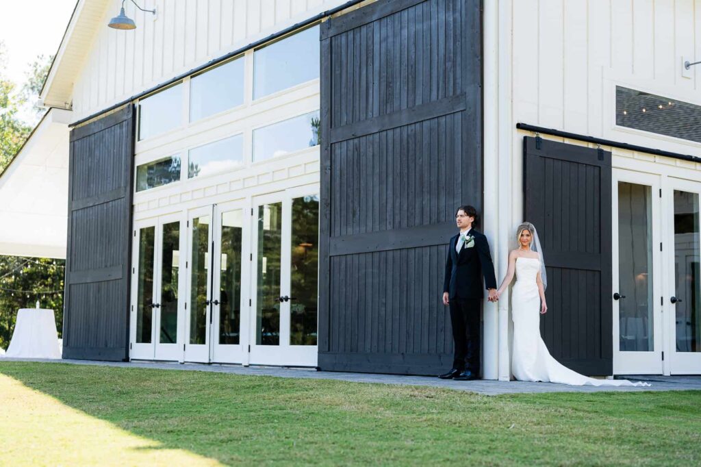 Emotional wedding first touch without a first look at The Venue at Daisy Hill; Fayetteville Georgia wedding photography.