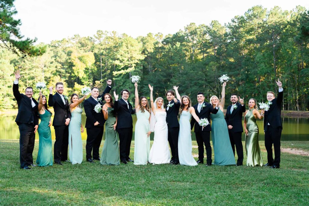 Wedding Party cheering at Daisy Hill wedding venue. captured  by Atlanta wedding photographer Peach State Weddings