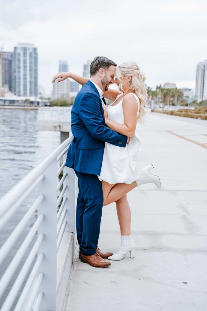 Couple at one of the best locations for engagement sessions in Tampa - St Pete Pier - Destination wedding photographer - timeless photography 