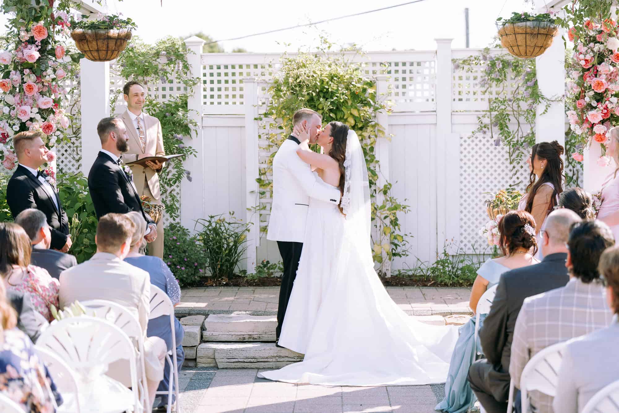 Bride and Groom's first Kiss at the Silver Lake Country Club wedding in Chicago, captured by Atlanta Wedding Photographer Peach State Weddings